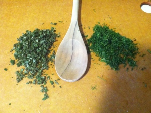 Finely chopped sage and dill. I put the spoon next to the piles so you can see how much of the herbs are there -- each pile is two tablespoons.